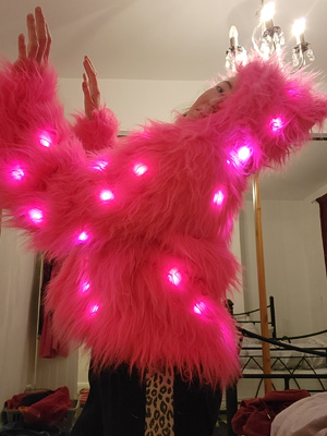 Pink illuminated fluffy coat